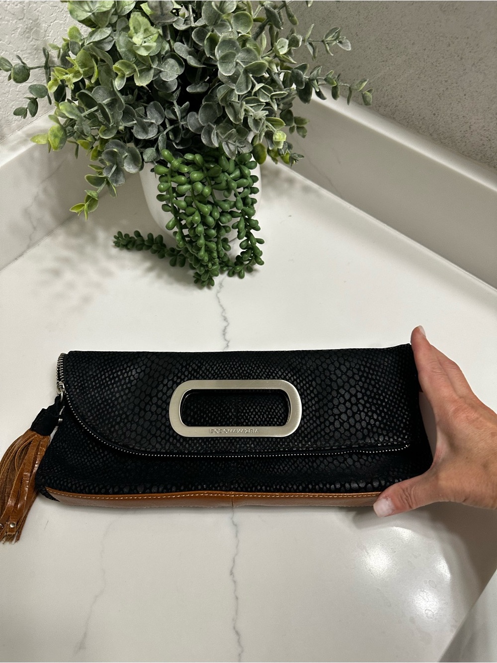 BCBG Mazazria Black Clutch with Brown Trim and Tassel